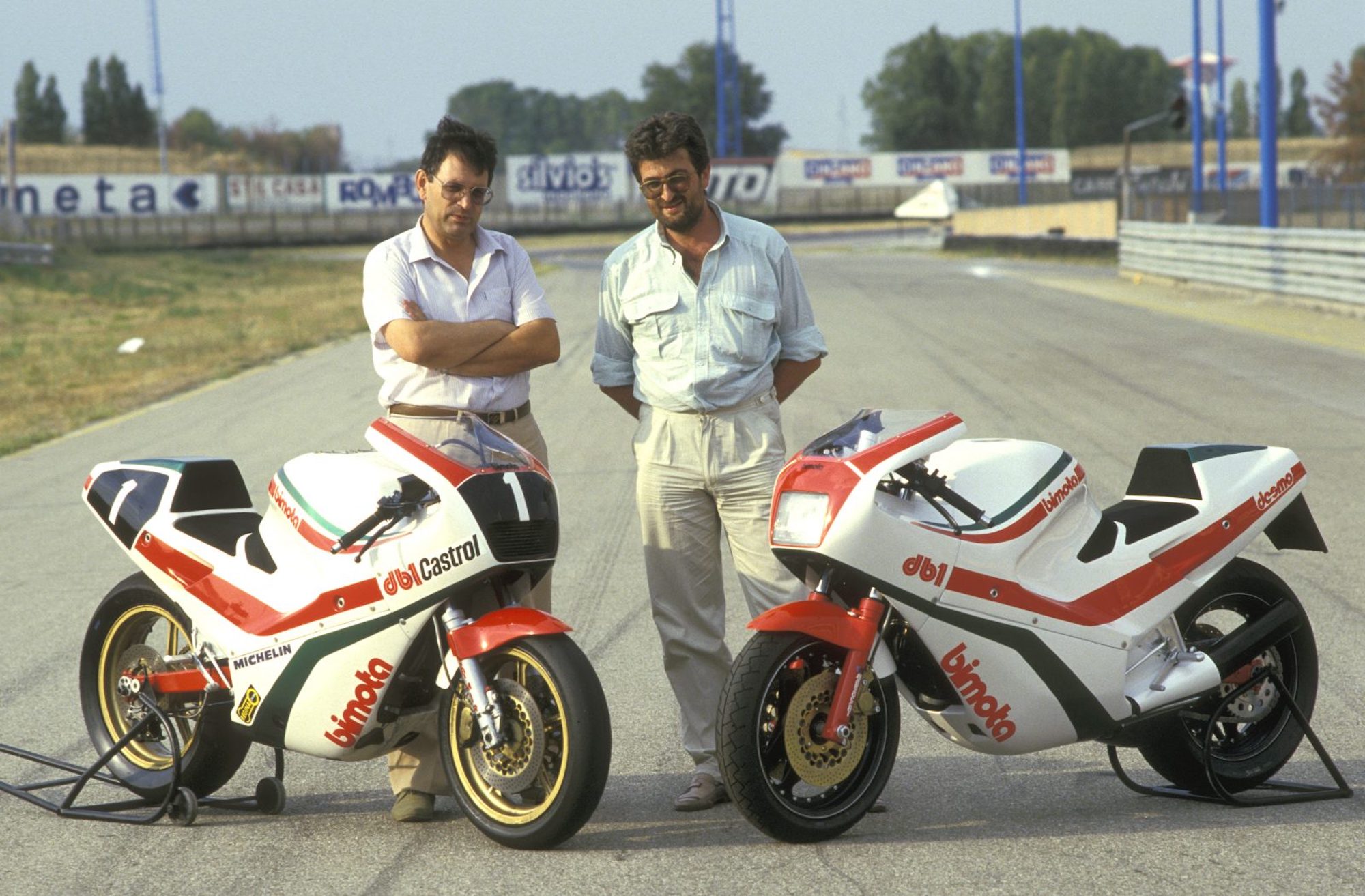 It's 1985; Martini and Giuseppe Morri pose next to the DB1. Media sourced from AMCN.