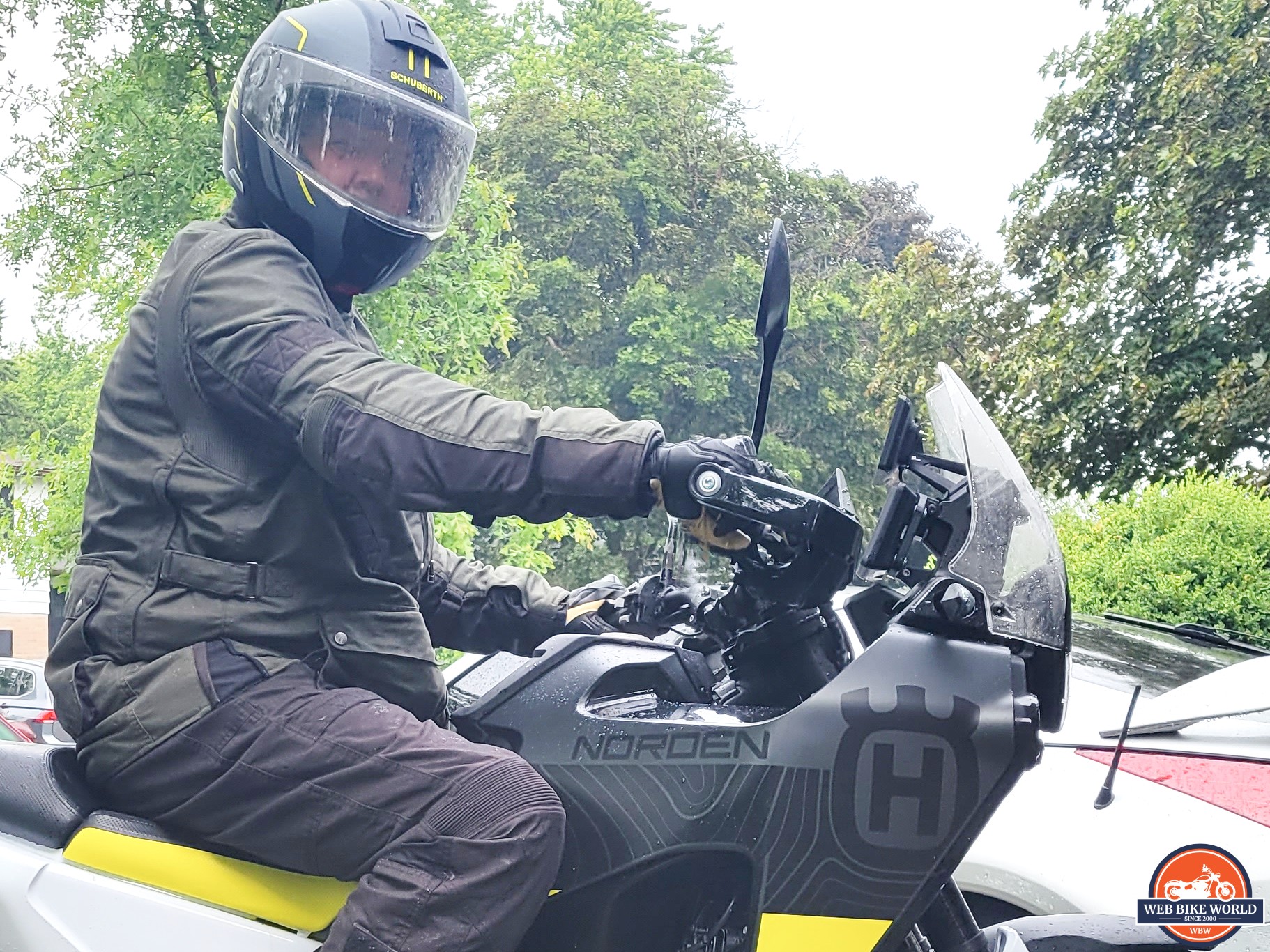 Side view of rider on a Husqvarna Norden 901 motorcycle