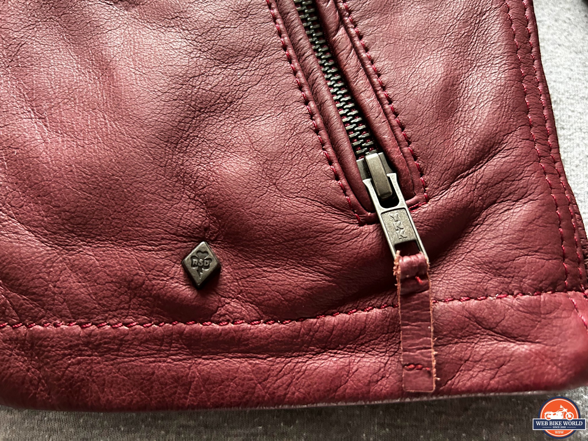 Closeup of the branded press stud on the RSD Seventy4 Atherton jacket