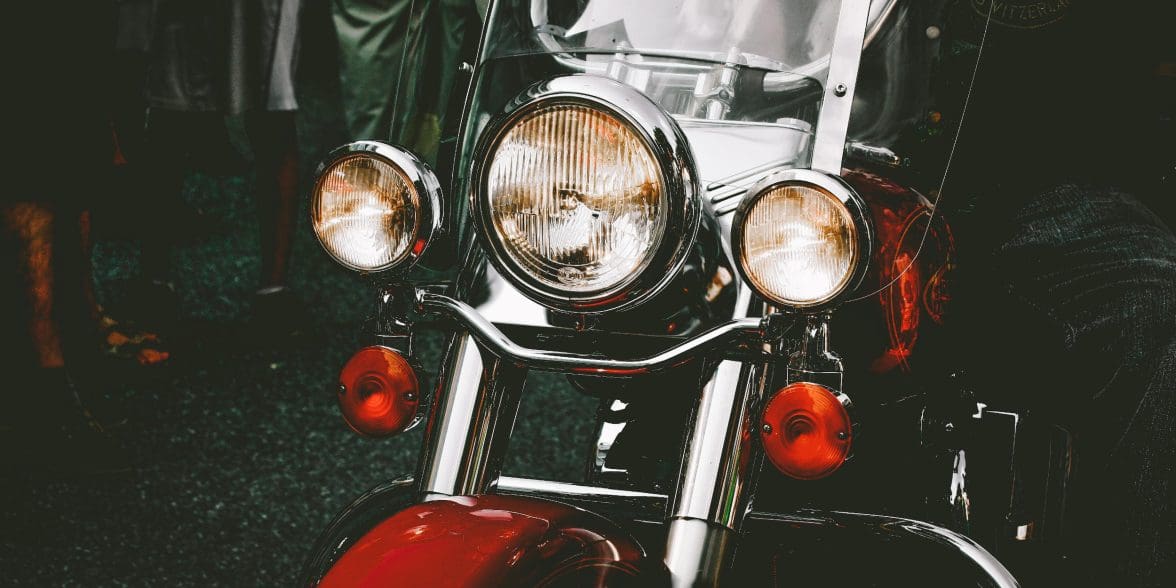 a motorcycle with hardwired headlight and daytime running lights