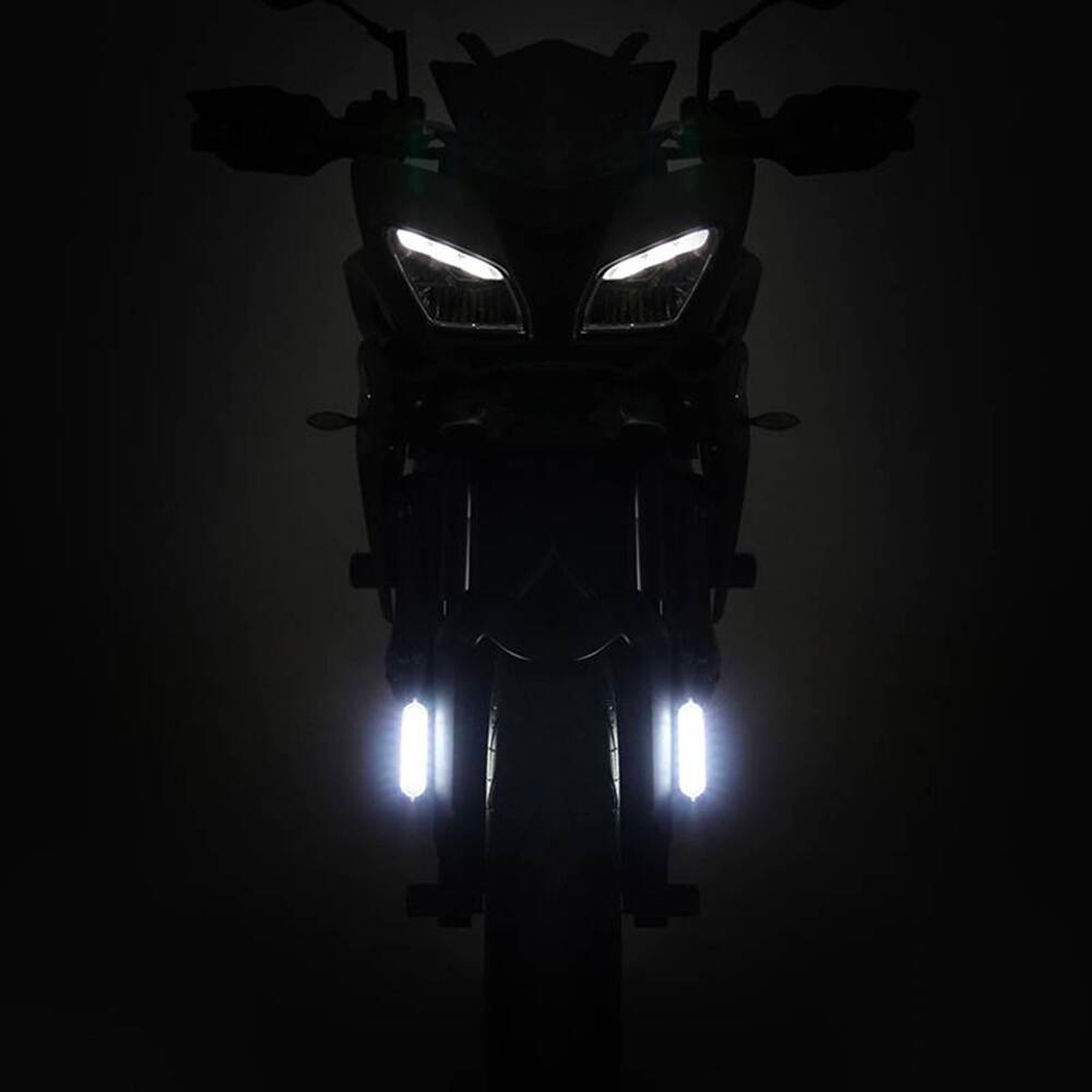 a motorcycle with hardwired headlight and daytime running lights