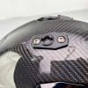 This mounting hole for the peak is an example of the sharp edges that create noise on the XT9000 helmet.
