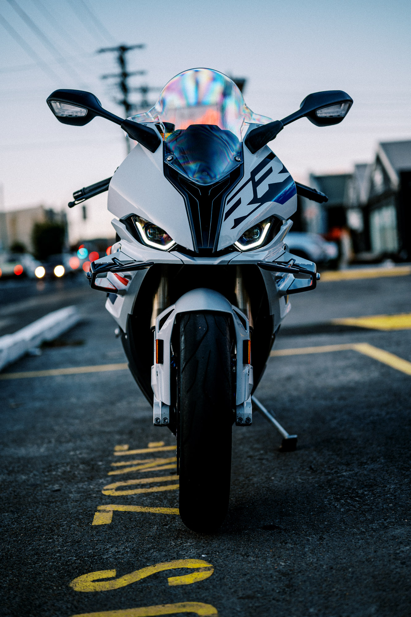 A 2023 BMW S 1000 RR motorcycle parked outside at dusk in Sydney