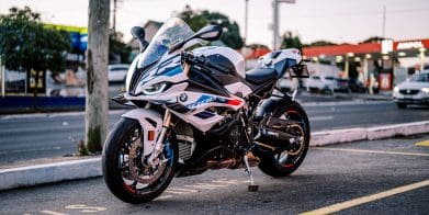 A 2023 BMW S 1000 RR motorcycle parked outside at dusk in Sydney