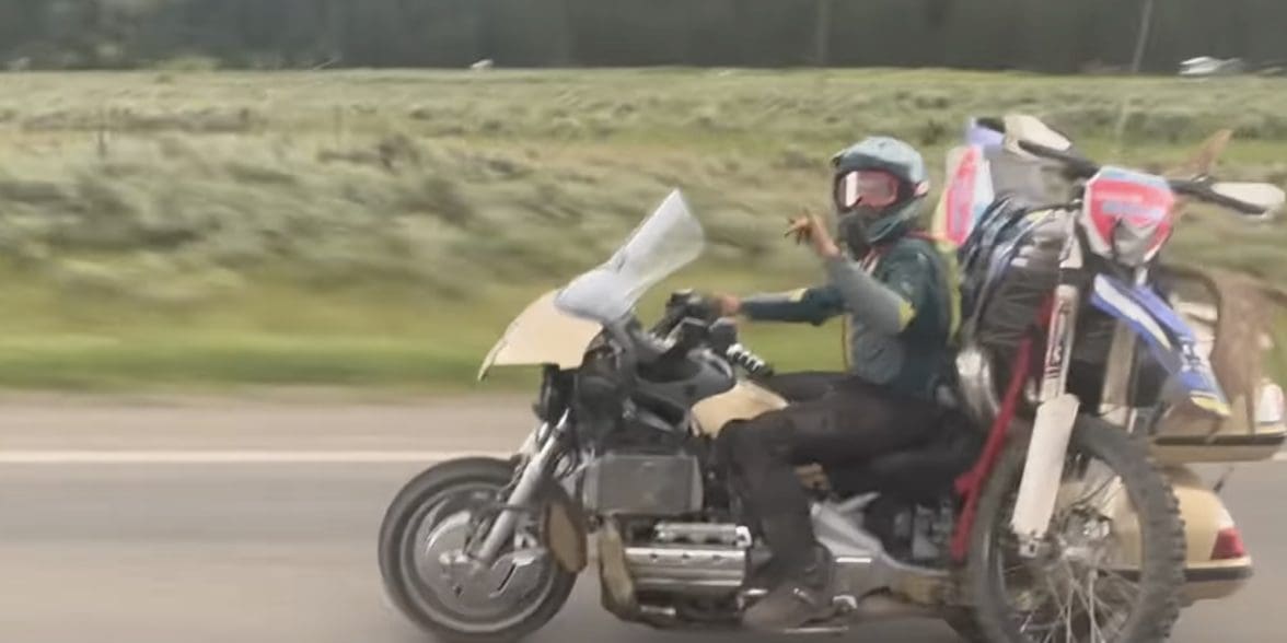 A view of a modded Honda Gold Wing off-roading a dirt bike to a local hilltop. Media sourced from Youtube.