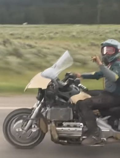 A view of a modded Honda Gold Wing off-roading a dirt bike to a local hilltop. Media sourced from Youtube.