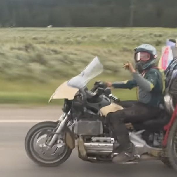 A view of a modded Honda Gold Wing off-roading a dirt bike to a local hilltop. Media sourced from Youtube.