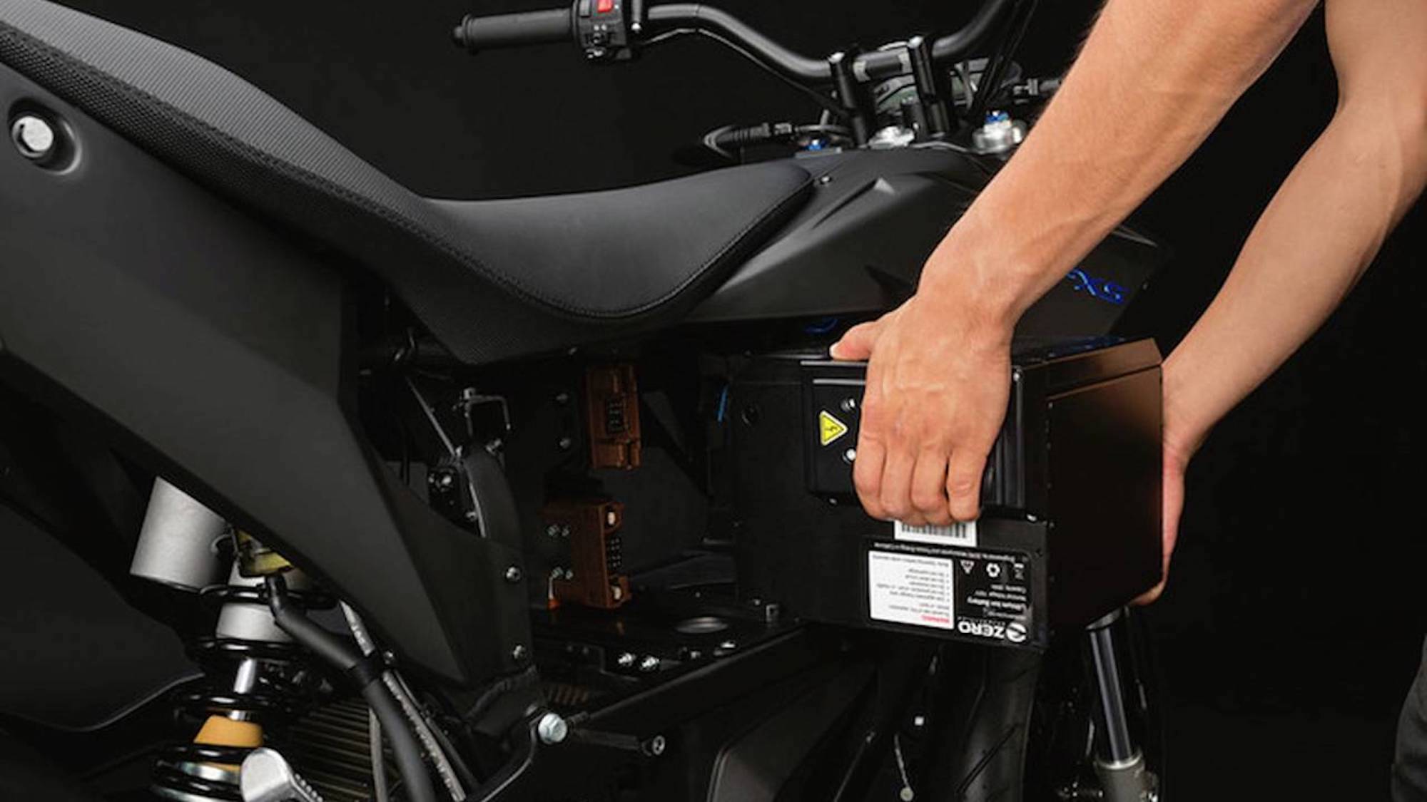 A battery being removed from an electric ZERO motorcycle. Media sourced from RideApart. 