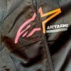 Closeup of the Alpinestars logo on the jacket