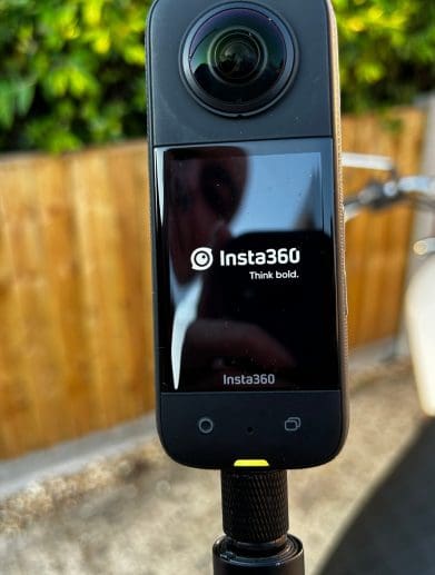 The Insta360 X3 mounted on motorcycle with the motorbike mount and invisible selfie stick