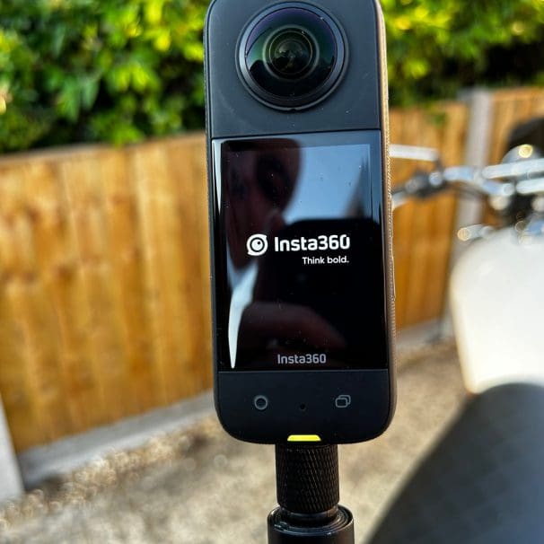 The Insta360 X3 mounted on motorcycle with the motorbike mount and invisible selfie stick