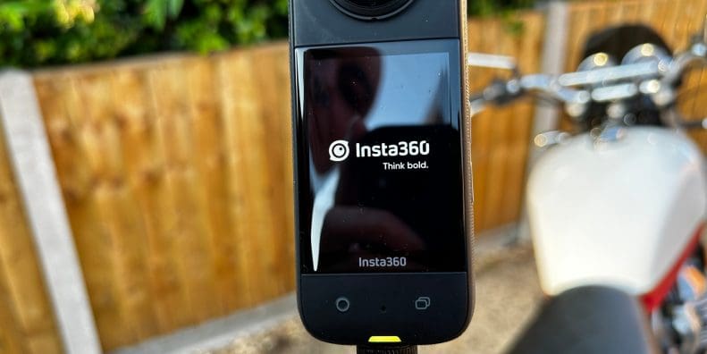 The Insta360 X3 mounted on motorcycle with the motorbike mount and invisible selfie stick