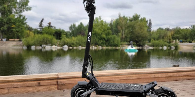 Apollo Phantom V3 scooter next to lake