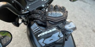 Carbo 7 Gloves on a Harley tank