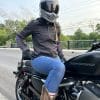 Rider wearing the Spidi Hoodie Armor Light Women's Jacket on Harley Davidson