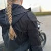 Rear view of Ashley wearing the Spidi Jacket inside out to display the shoulder armor