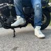 XPD Moto-1 Leather shoes in front of a bike