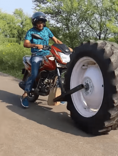 CrazyXYZ's coverage of a TVS Victor with a tractor tire for a front wheel. Media sourced from Youtube.