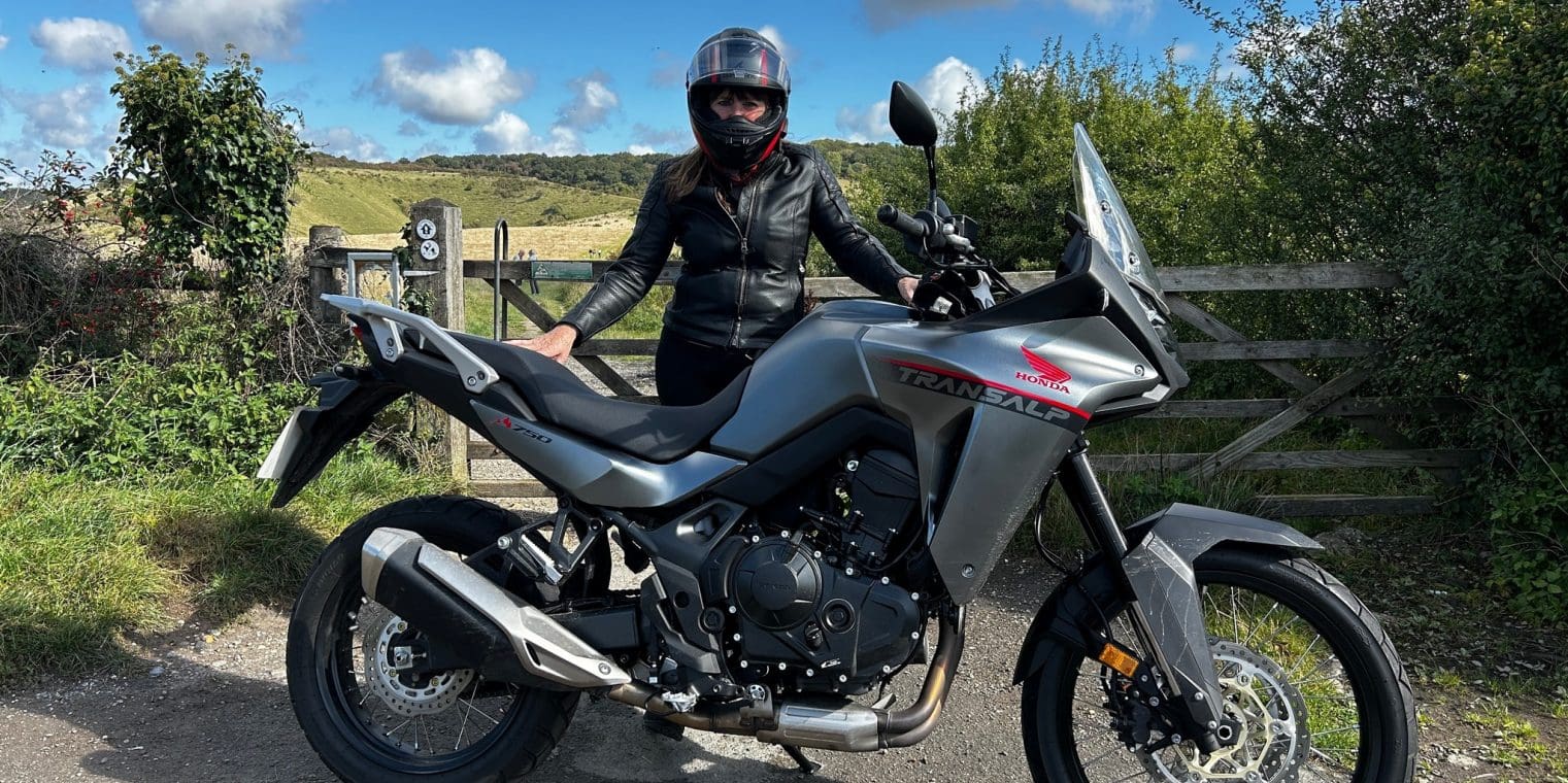 Rider standing behind the 2023 Honda XL750 Transalp