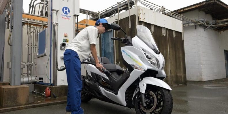 Suzuki's Burgman 400 ABS scooter, showing off reworked inners as a hydrogen tech test model. Media sourced from CycleWorld.