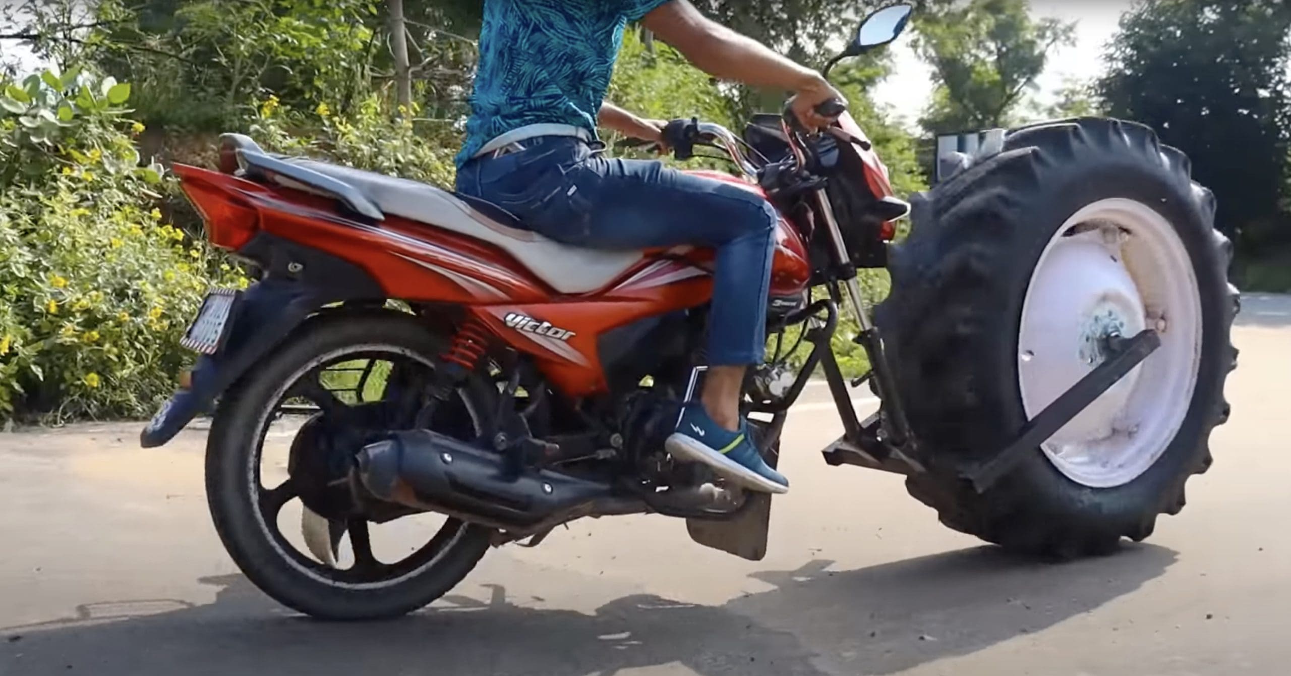 CrazyXYZ's coverage of a TVS Victor with a tractor tire for a front wheel. Media sourced from Youtube.