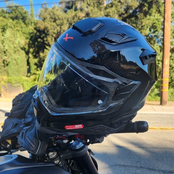 Nexx X.WST2 Carbon Helmet resting on handlebars