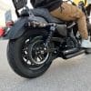 Rider on a Harley Davidson Iron 883 rear angle