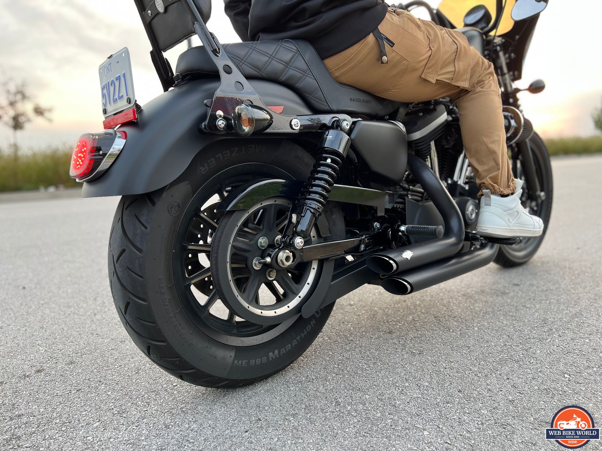 Rider on a Harley Davidson Iron 883 rear angle