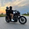 Two riders on a Harley Davidson Iron 883
