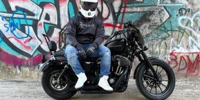 Devan sitting on an Iron 883