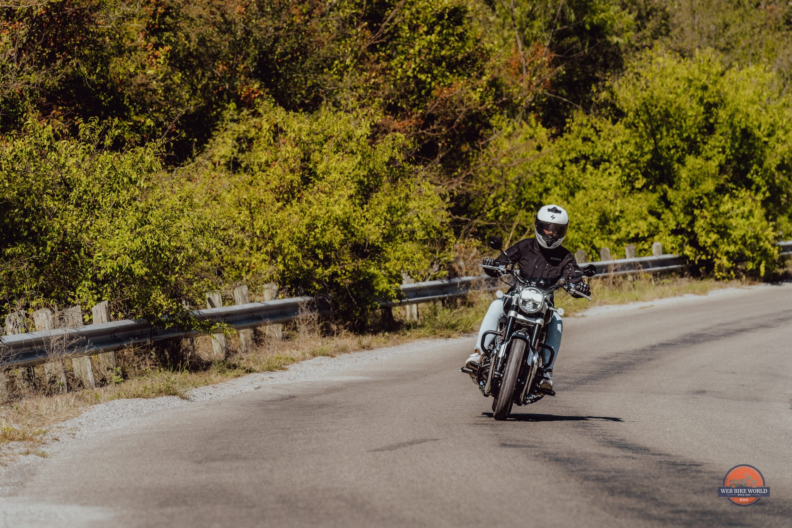 Amanda Quick aboard her choice of Super Meteor 650 for Royal Enfield's Pure Cruising event, executing a gentle lean. Media provided by Royal Enfield.