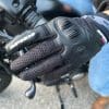 Close up of the Spidi gloves gripping handle bars