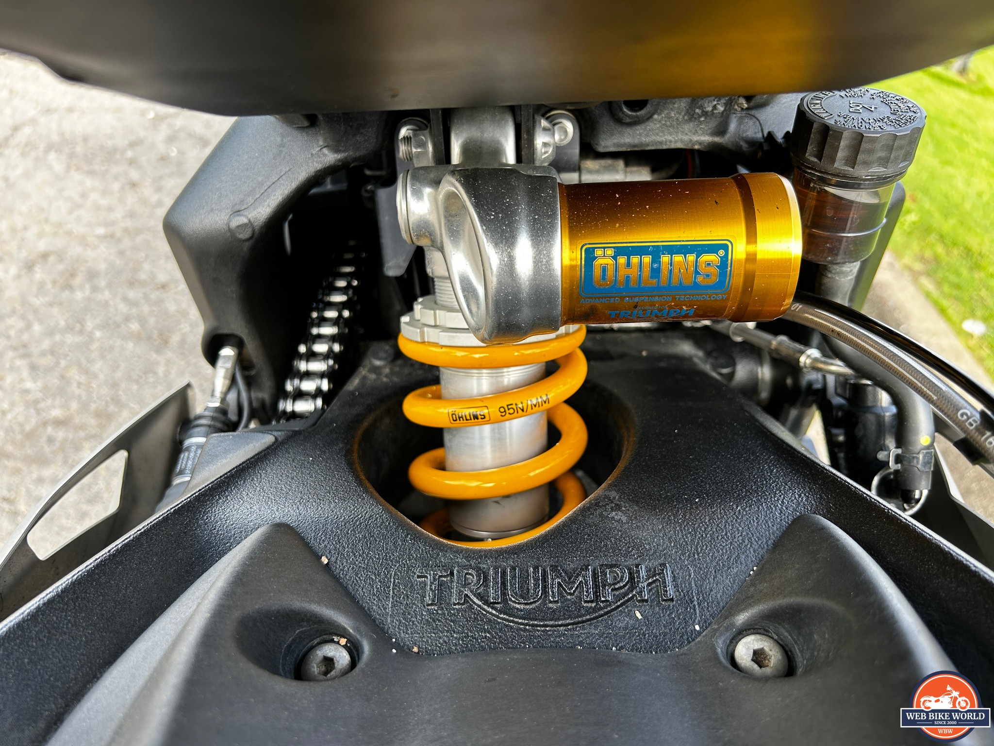 Closeup of Ohlins suspension on 2023 Triumph Street Triple 765RS