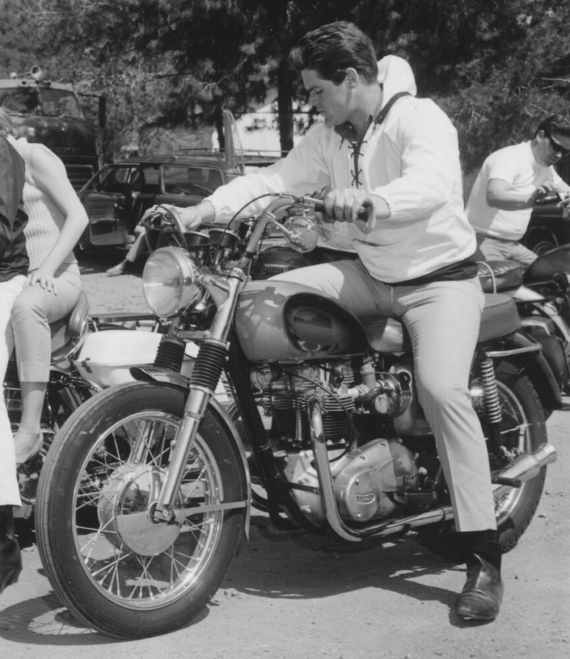 Jerry Schilling, a member of Elvis's Memphis Mafia gang, with the Triumph Motorcycle bestowed by Elvis Presley. Media provided by Triumph.