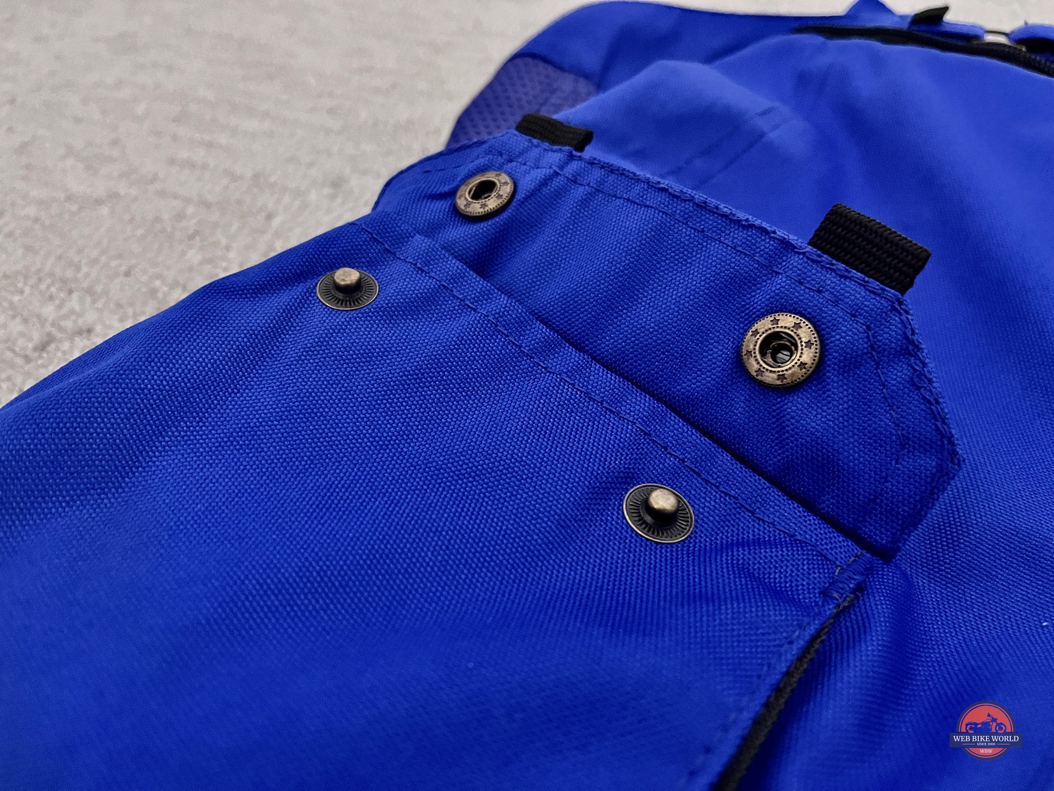 Snap buttons of a pocket on the Raven Rova Falcon Textile Pants