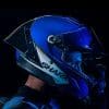 Right side view of a motorcycle racer wearing a helmet.