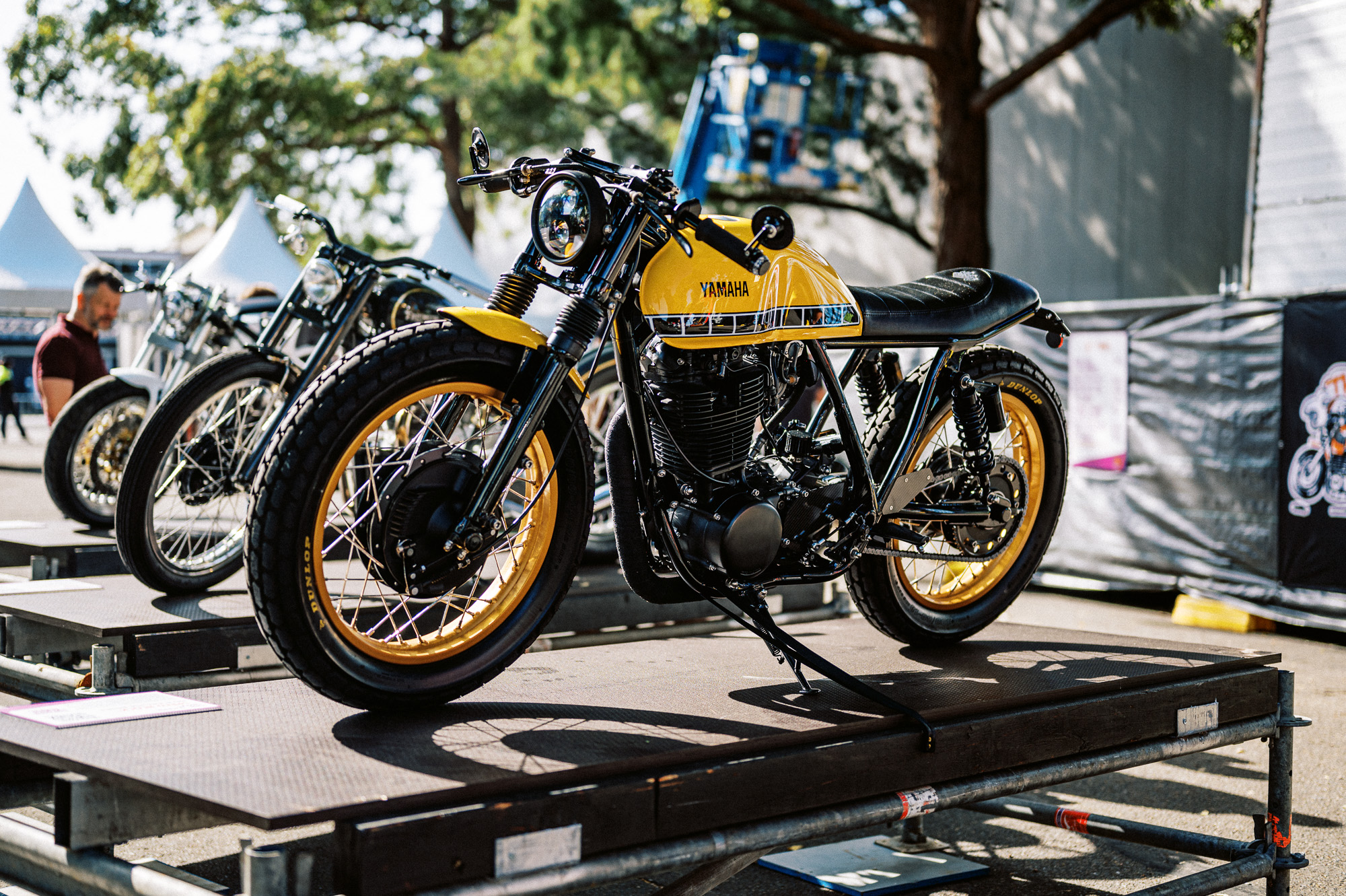 A Yamaha SR400 tracker on display at Sydney's 2023 Throttle Roll motorcycles show.