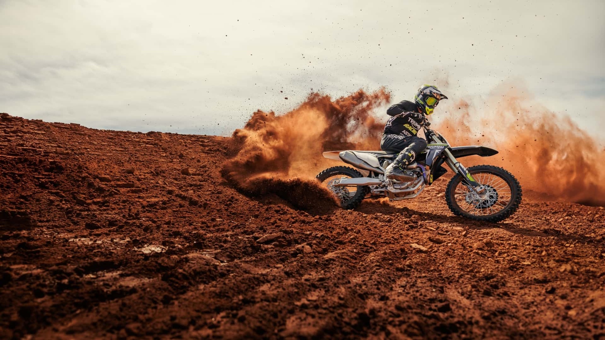 Side view of a motocross motorcycle in the desert.