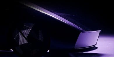 An abstract purple image of a part of an electric motorcycle.