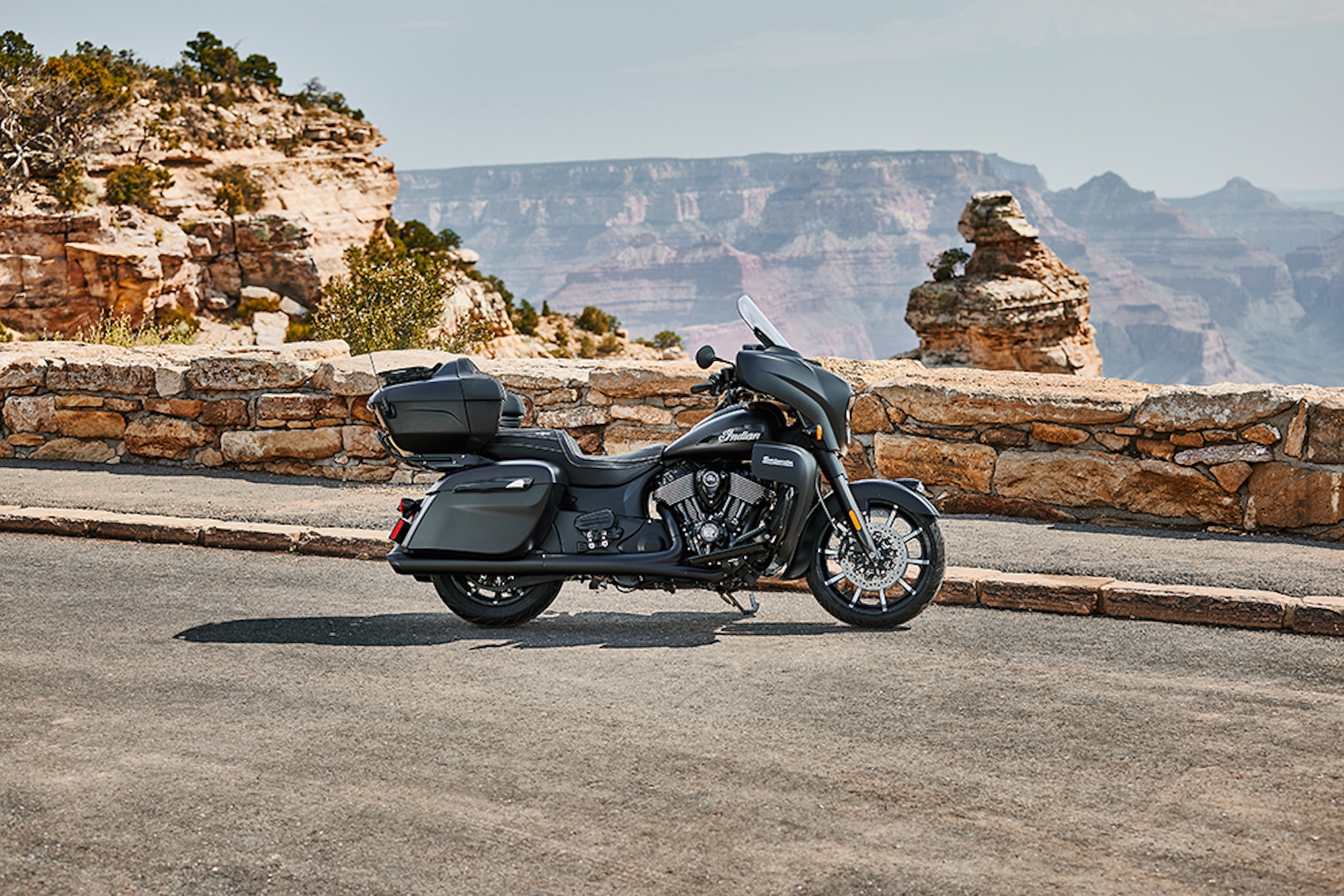 Indian's 2024 Roadmaster Dark Horse motorcycle in a canyon. 
