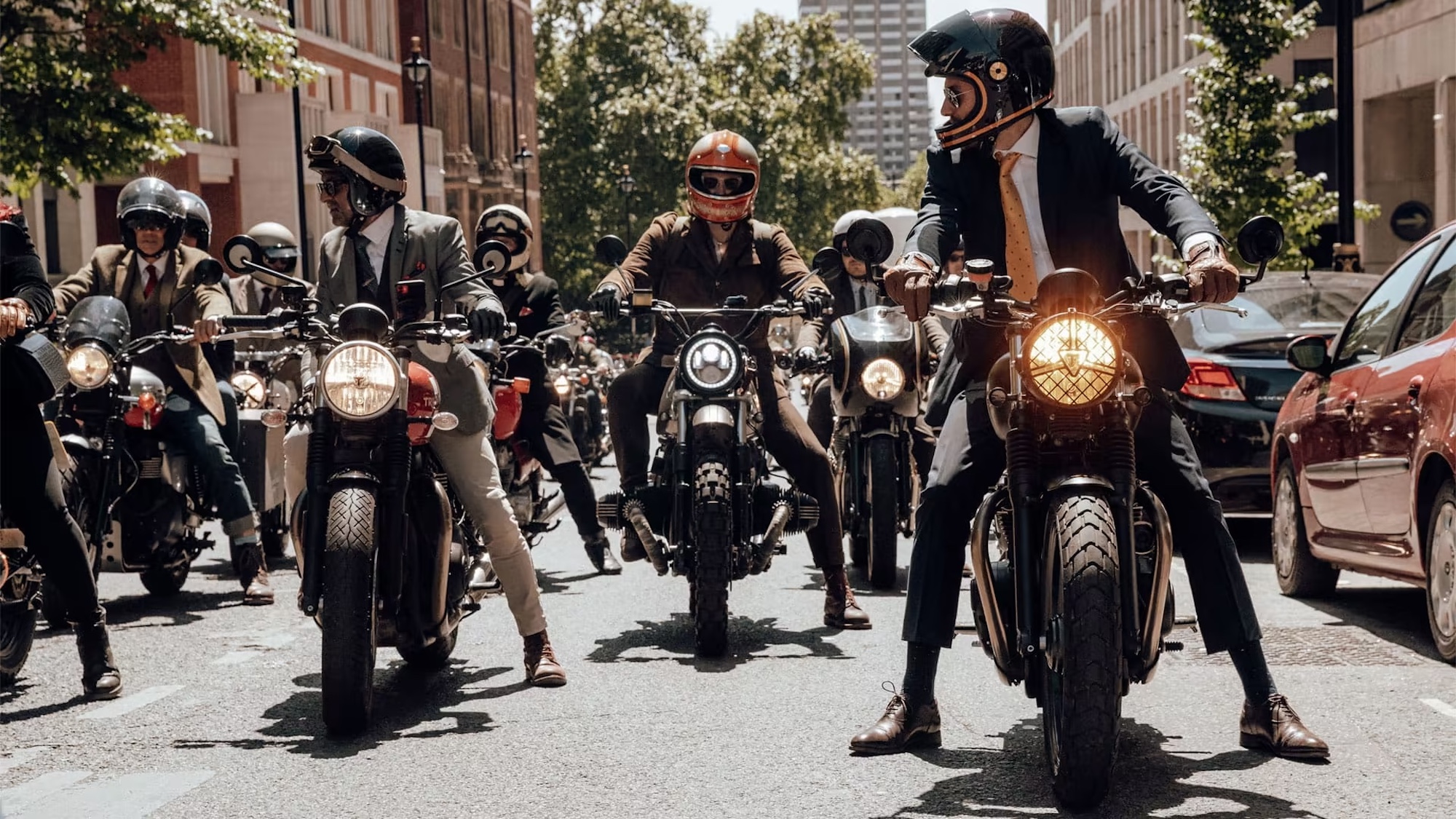 a bunch of motorcyclists on vintage and classic motorcycles.