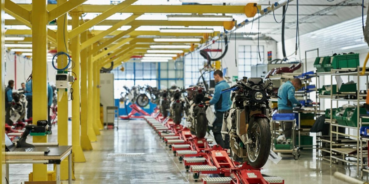 A view of a motorcycle production line in a factory.