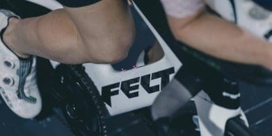 A close-up of a person on a Felt bicycle.