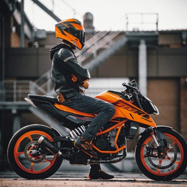 A KTM Duke 390 motorcycle on the road.