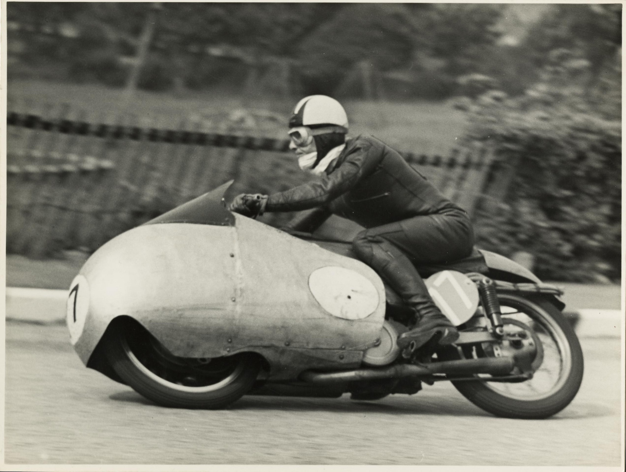 Cecil Sandford aboard a Moto Guzzi machine. Media provided by iMuseum.