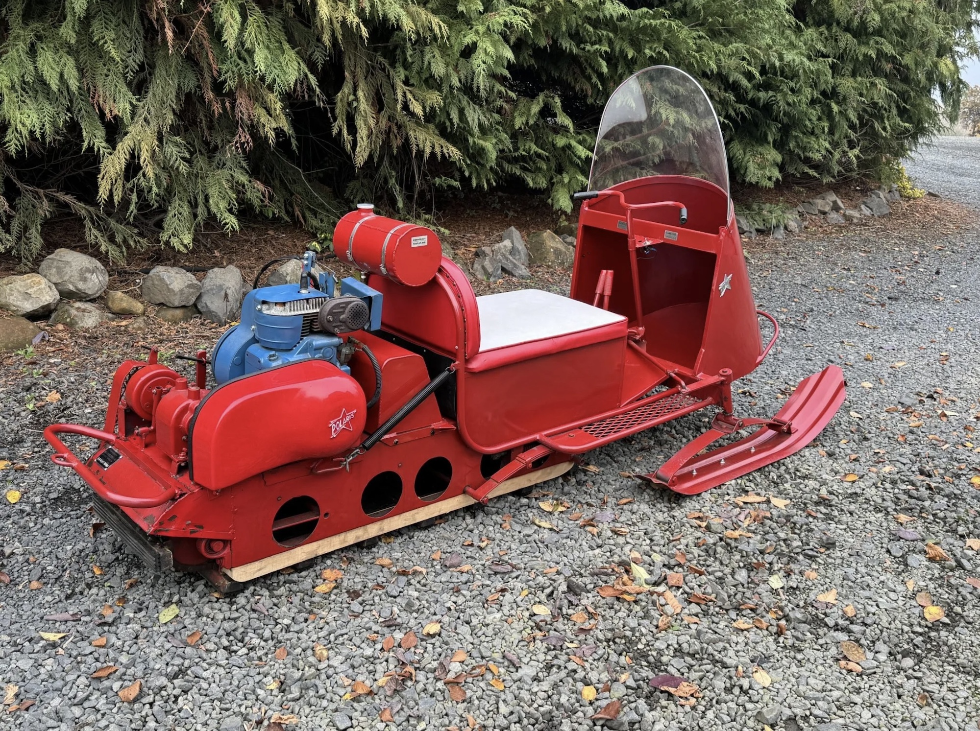 A 1964 Polaris Sno-Traveler Pacer K80D snowmobile refurbished to look like Santa's sleigh. Media provided by BringATrailer.