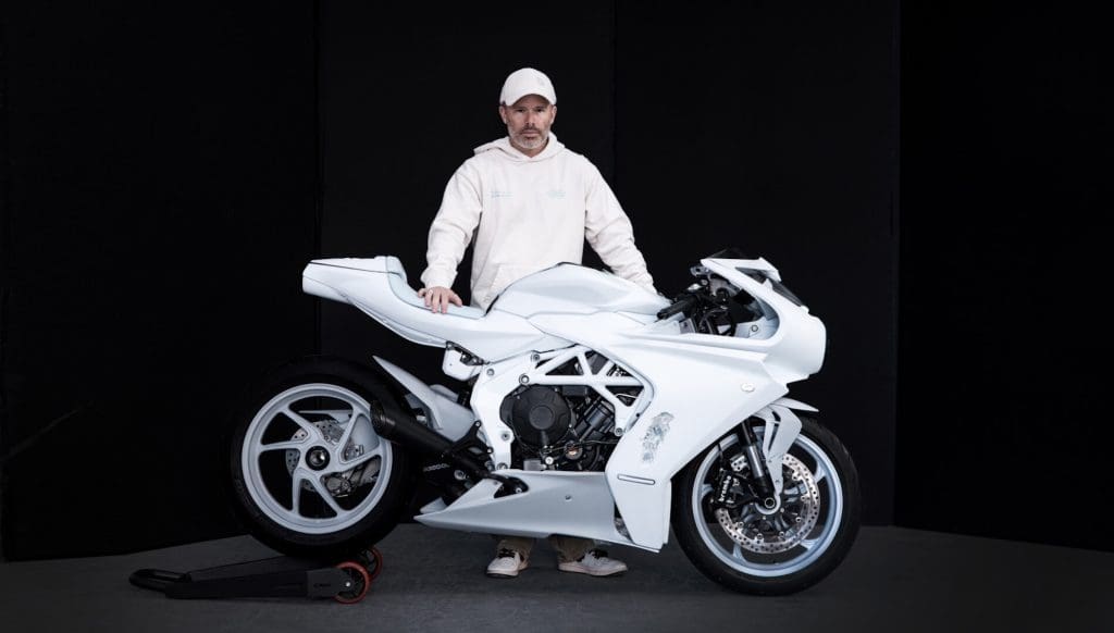 Daniel Arsham behind his Superveloce Arsham motorcycle.