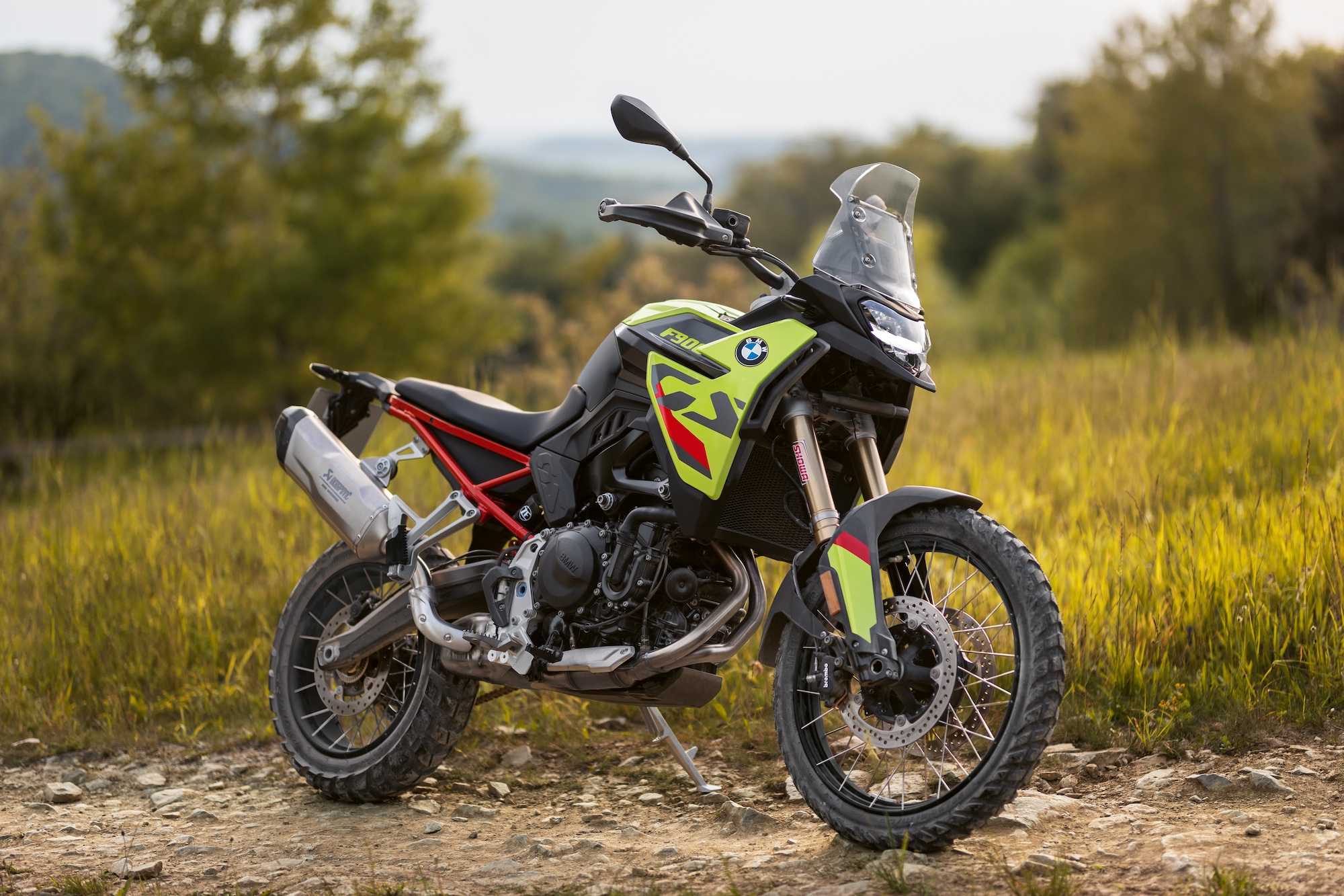 A side view of a BMW motorcycle outside.