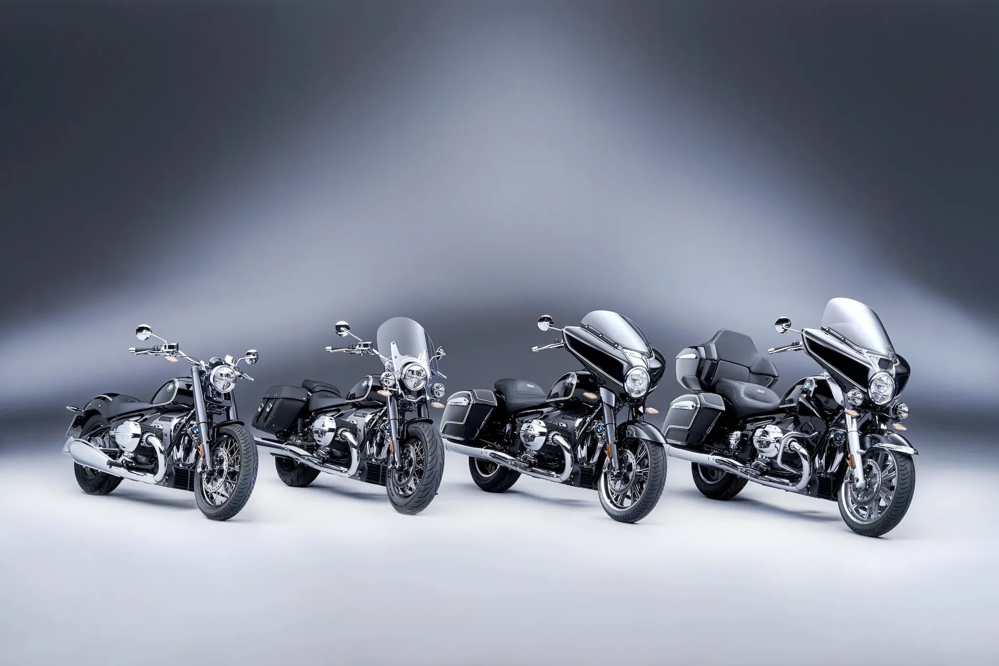 Four BMW motorcycles.