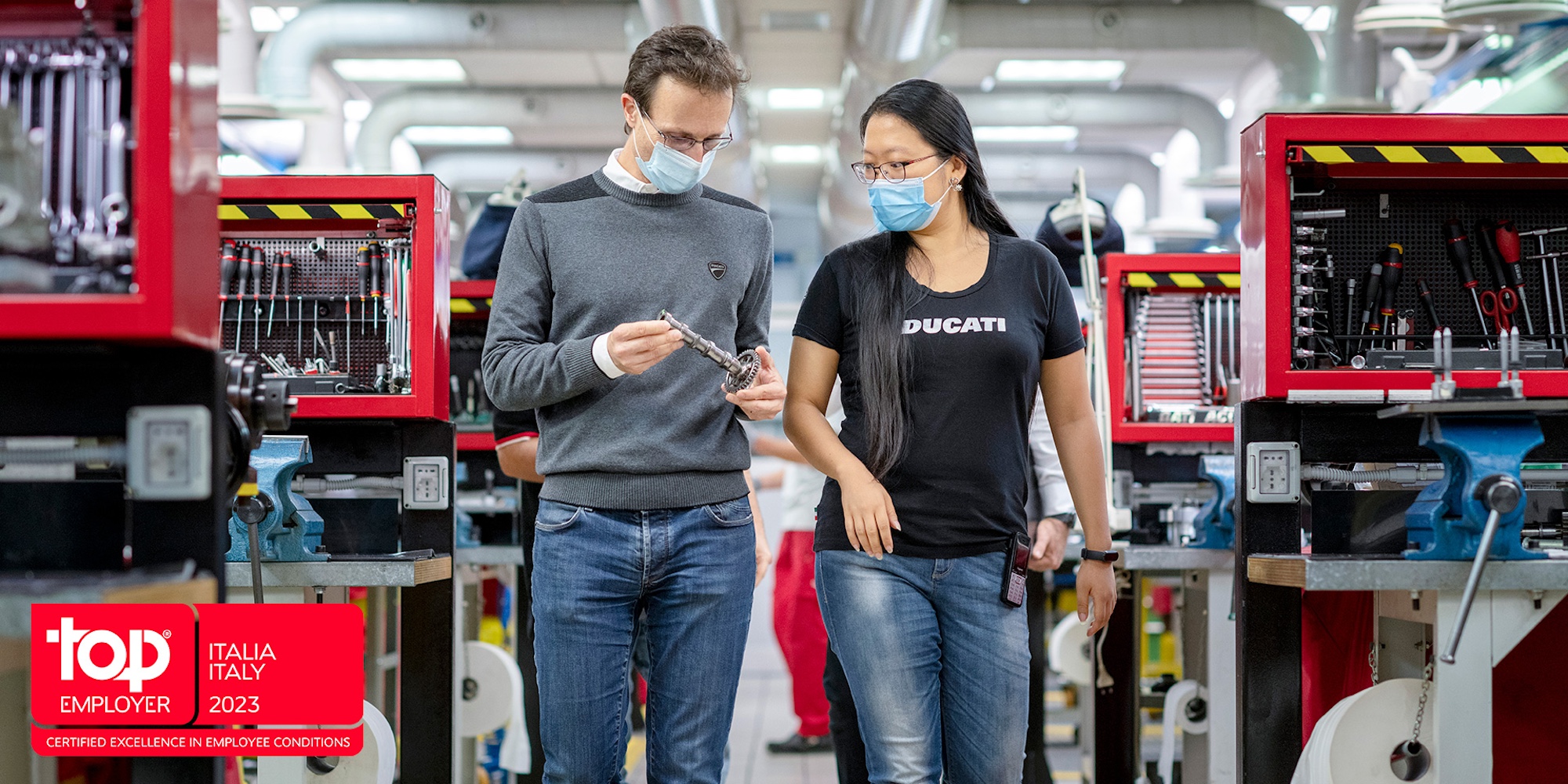 Two employers in a Ducati factory.